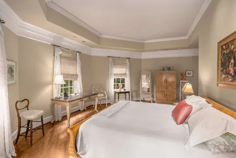 a view of a kitchen with fridge and workspace