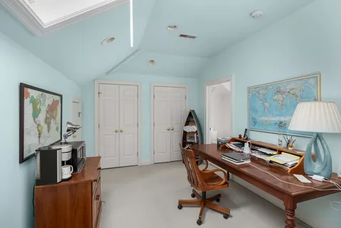a view of livingroom with furniture and white walls