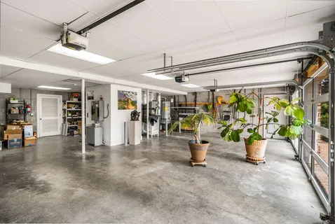 a view of field with trees in the background