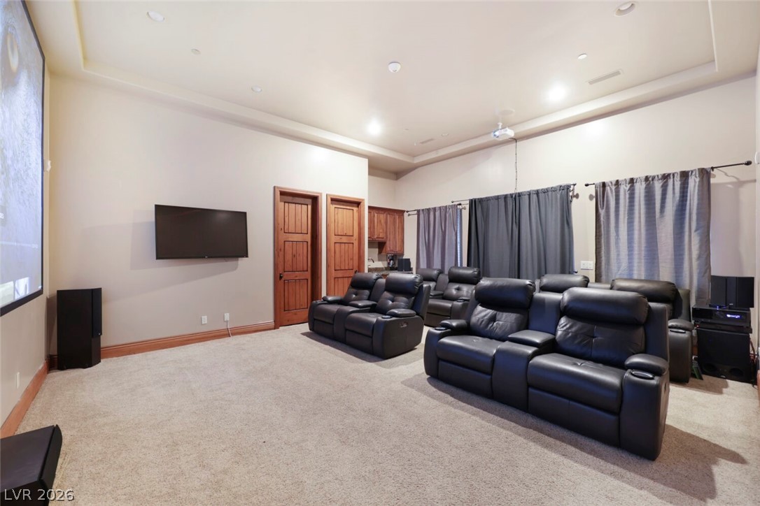 1065 Kratzer Circle Henderson, NV 89002 - Photo 30 of 62 Cinema featuring light carpet, a tray ceiling, and recessed lighting