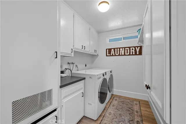an aerial view of a backyard with chairs