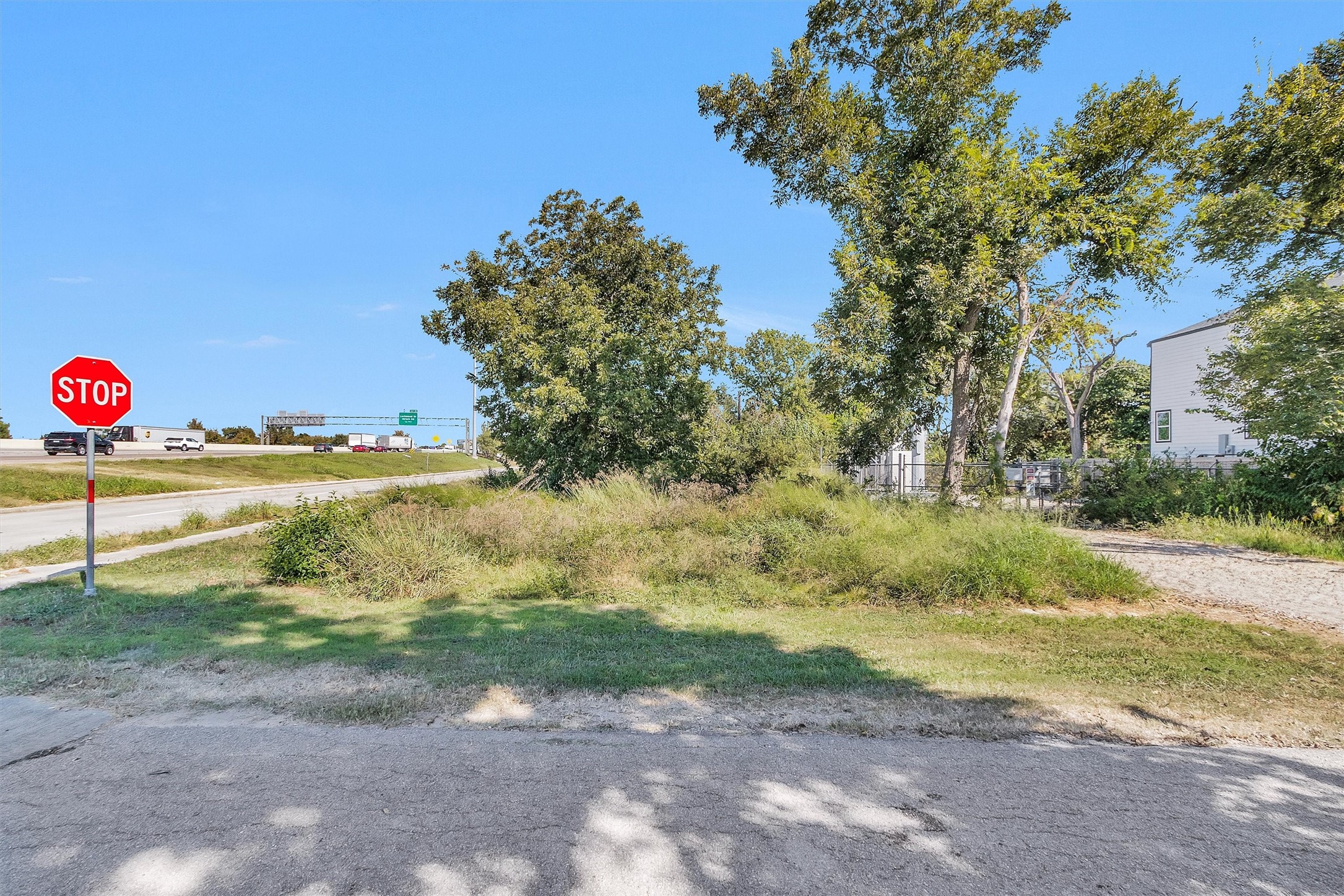 4844 Sayers Street Houston, TX 77026 - Photo 2 of 20 a view of a yard with a tree