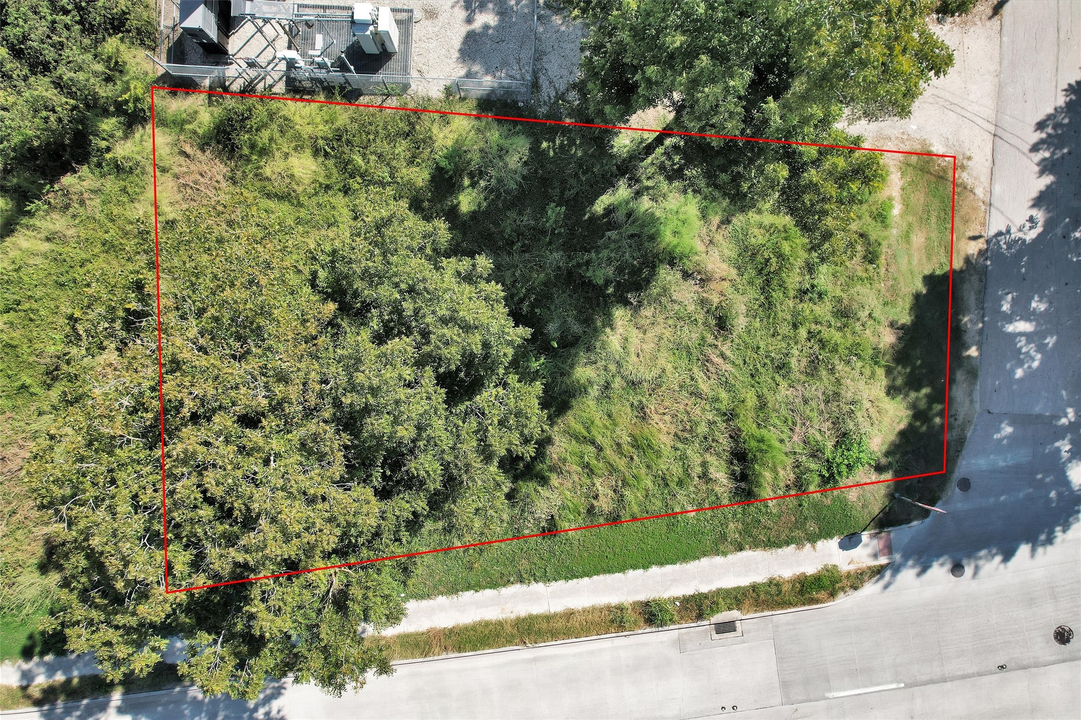 4844 Sayers Street Houston, TX 77026 - Photo 9 of 20 a view of a house with a small yard and large trees