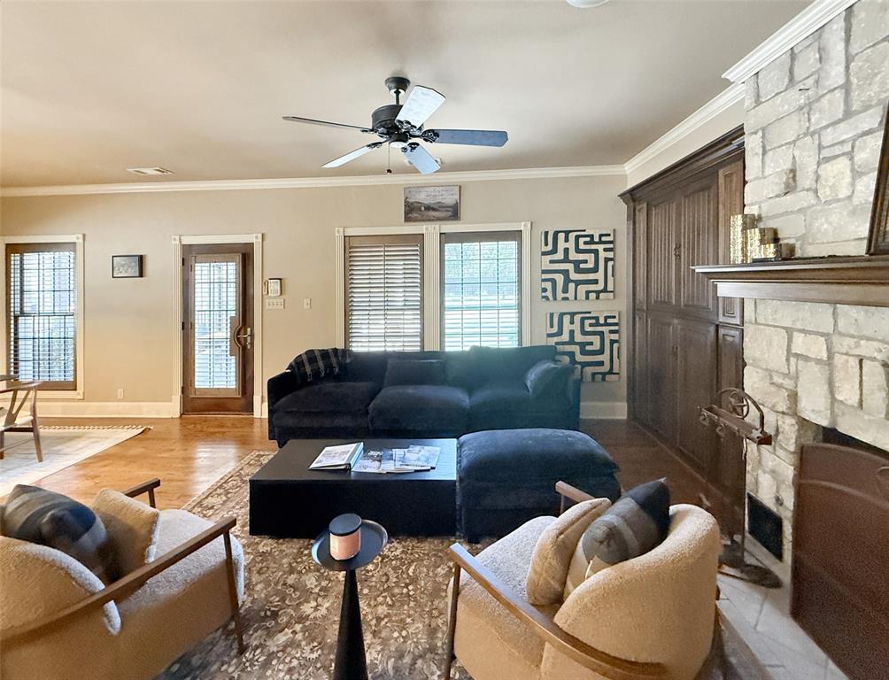 1026 Farm To Market Road 131 Denison, TX 75020 - Photo 13 of 40 a living room with furniture a chandelier and a window