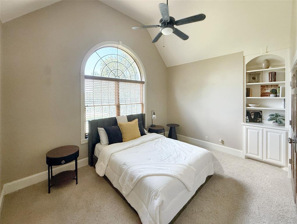 1026 Farm To Market Road 131 Denison, TX 75020 - Photo 18 of 40 a bedroom with a bed and a window