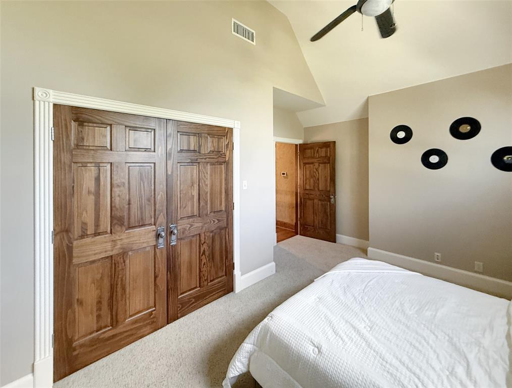 1026 Farm To Market Road 131 Denison, TX 75020 - Photo 19 of 40 a bedroom with a bed and a dresser
