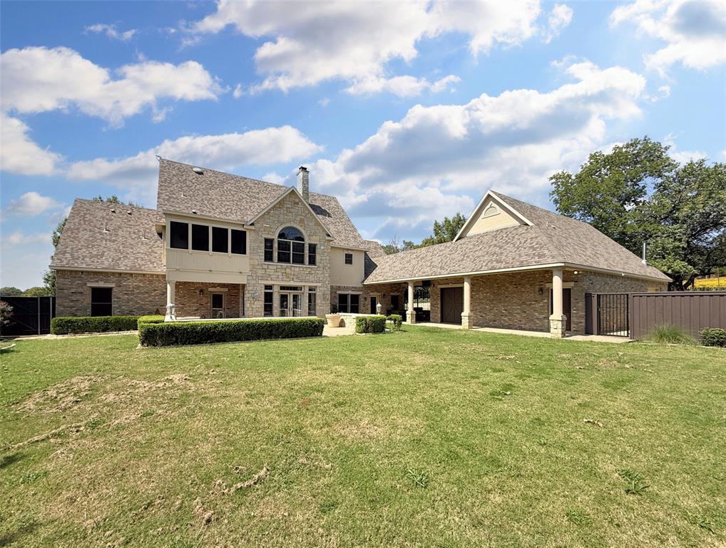 1026 Farm To Market Road 131 Denison, TX 75020 - Photo 37 of 40 a front view of a house with a garden