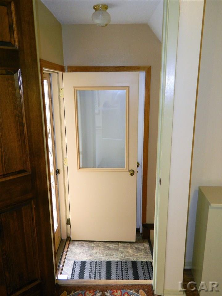 2689 West Russell Road Tecumseh, MI 49286 - Photo 19 of 28 Back door entry/Garage entry area