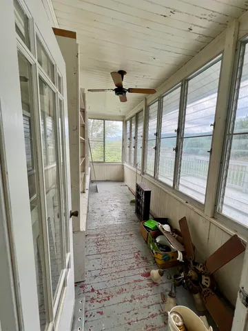a bathroom with a sink toilet and a mirror