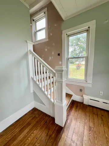 a view of a kitchen from the hallway