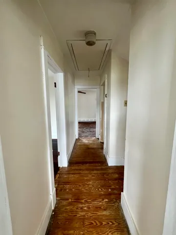 a view of deck with wooden floor and fence