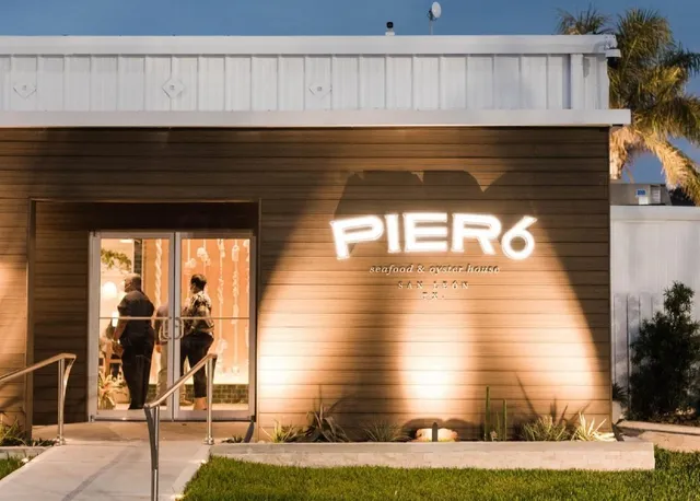 a front view of a house with garage