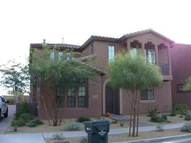 2333 West Sleepy Ranch Road Phoenix, AZ 85085 - Photo 1 of 6 a front view of a house with garden