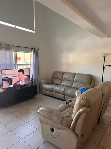 $170,000 | 18101 Northwest 68th Avenue, Unit C202, Hialeah, FL 33015