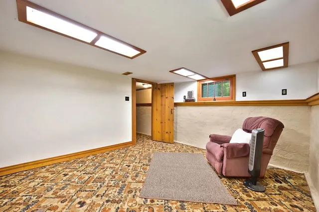 an aerial view of a city with a lake view