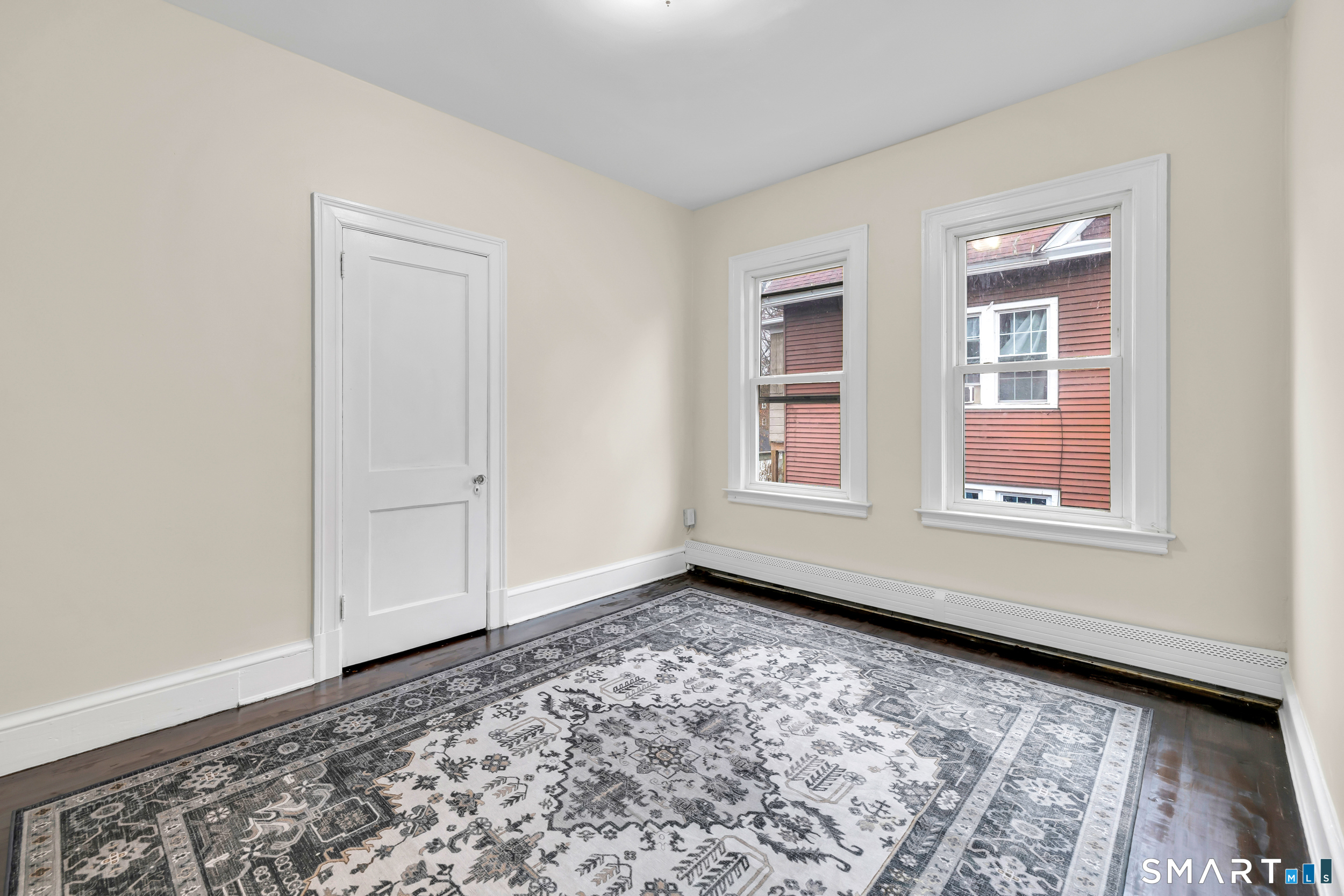72 Sterling Street Hartford, CT 06112 - Photo 14 of 25 a view of empty room with wooden floor