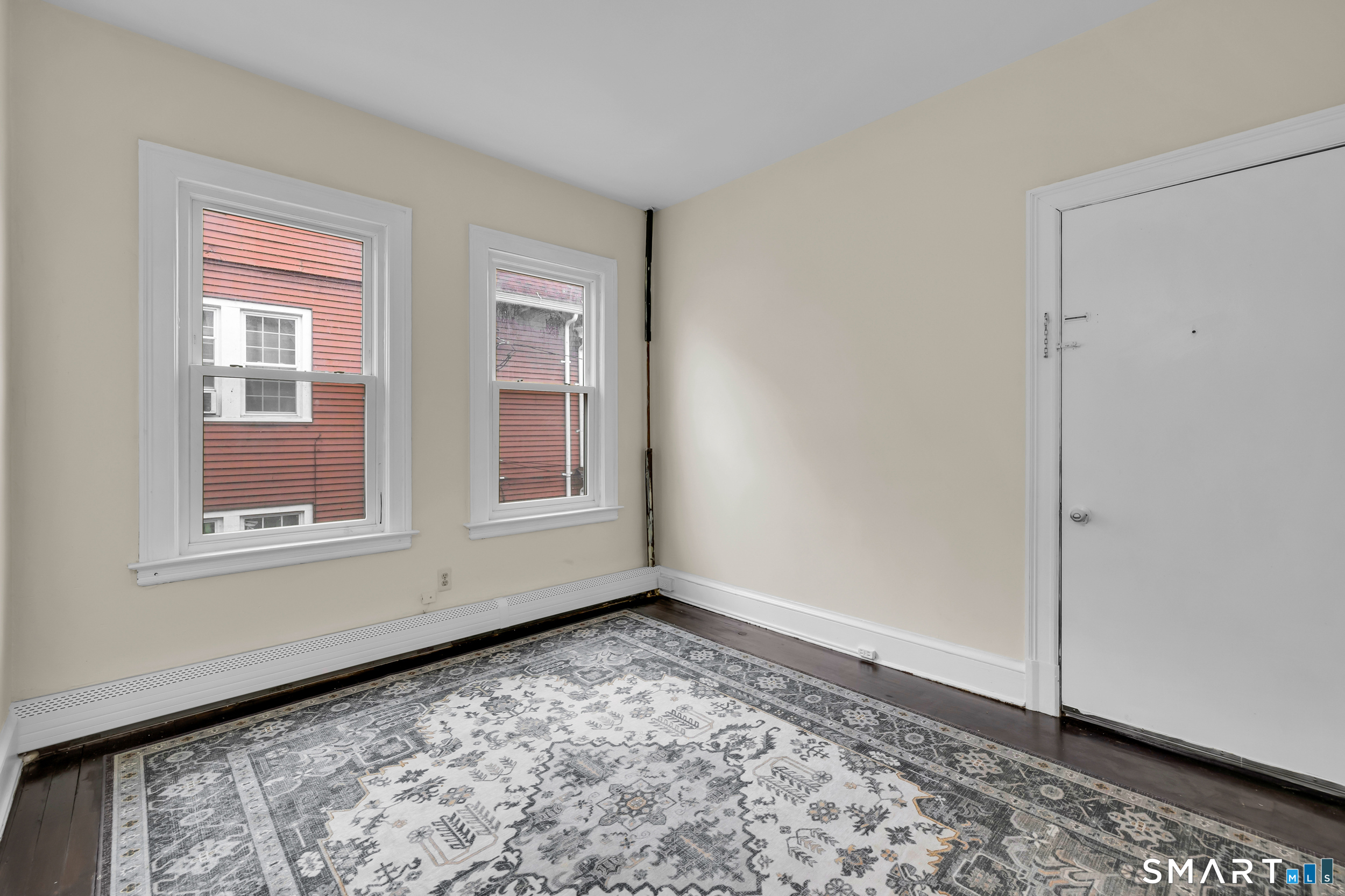 72 Sterling Street Hartford, CT 06112 - Photo 17 of 25 a view of empty room with window