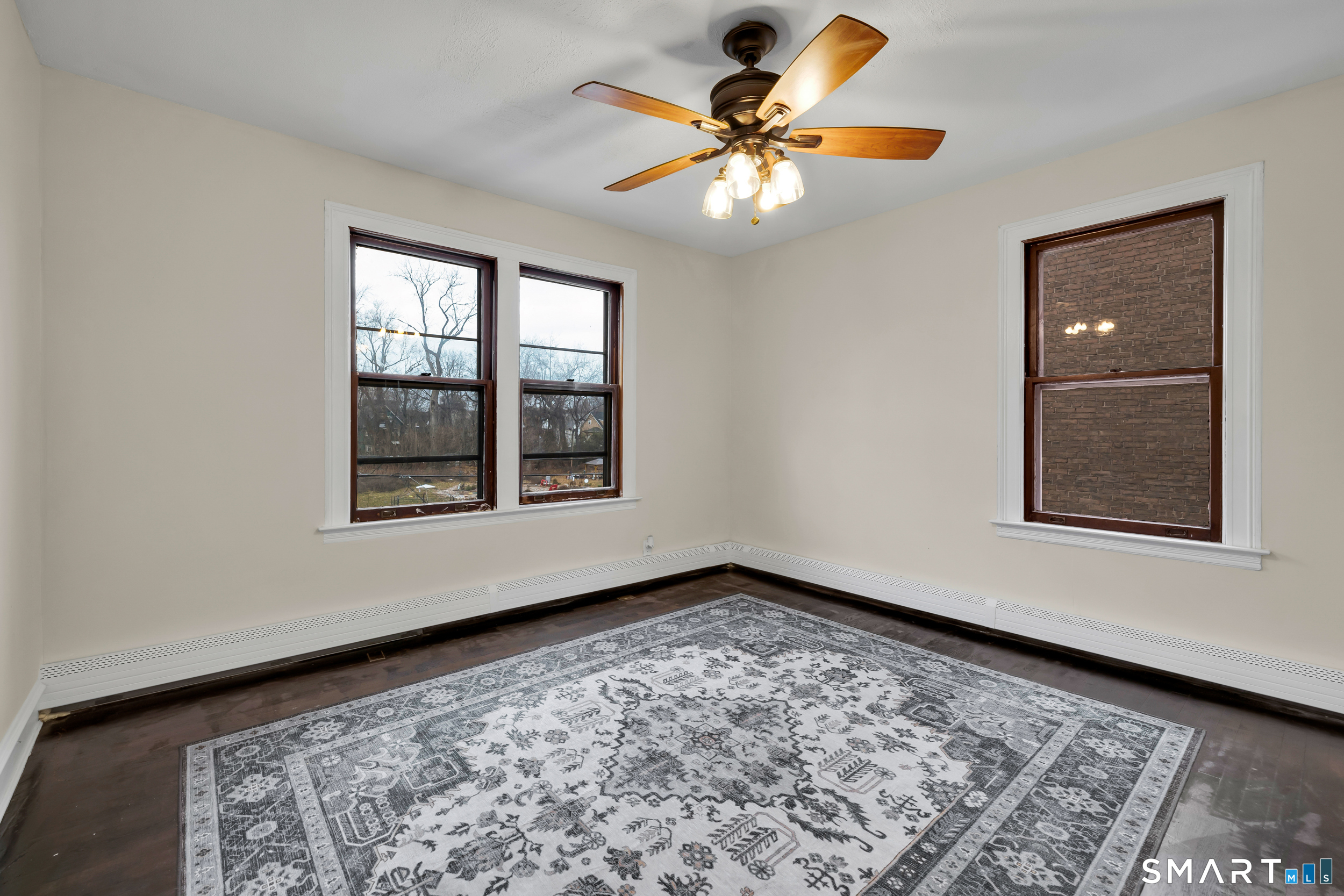 72 Sterling Street Hartford, CT 06112 - Photo 4 of 25 a view of an empty room with a window