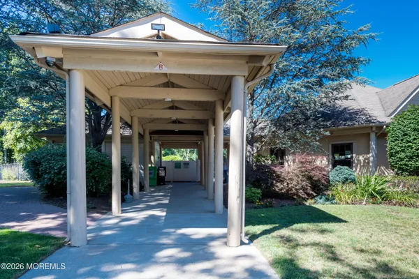 a view of a swimming pool with a yard