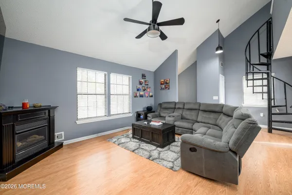 a living room with furniture and a window