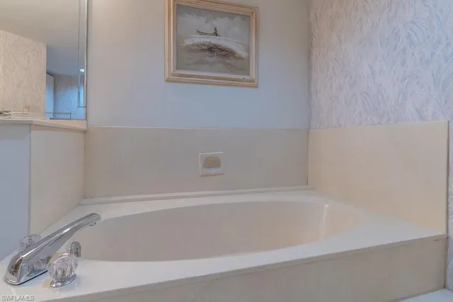 a bathroom with bathtub