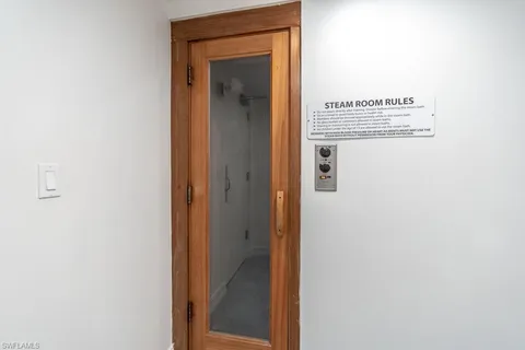 a picture of a bathroom with a mirror