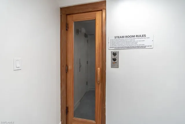 a picture of a bathroom with a mirror