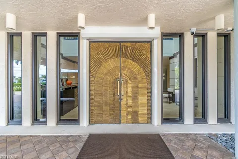 a view of front door with a glass door