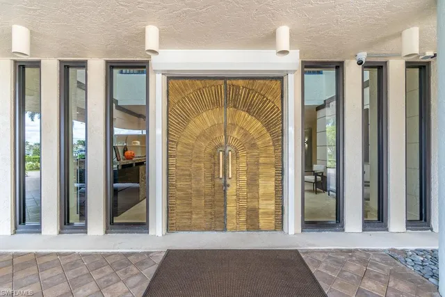 a view of front door with a glass door