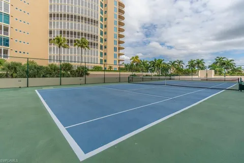 a view of an outdoor space and tennis court