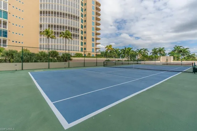 a view of an outdoor space and tennis court