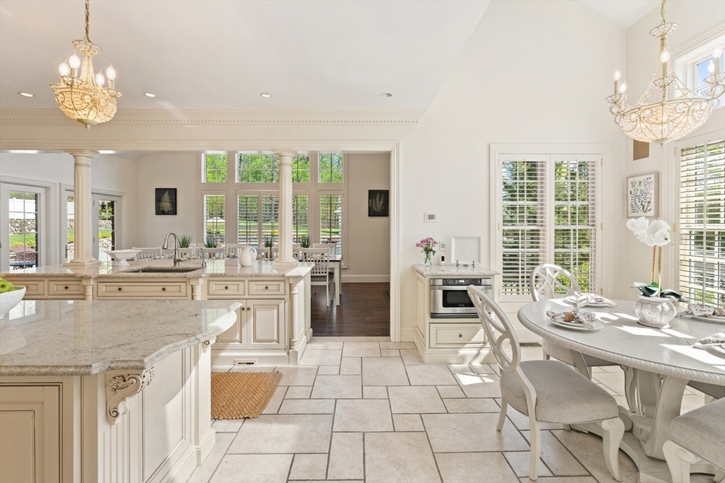 46 Porter Road Andover, MA 01810 - Photo 14 of 42 a kitchen with stainless steel appliances granite countertop a stove and a sink