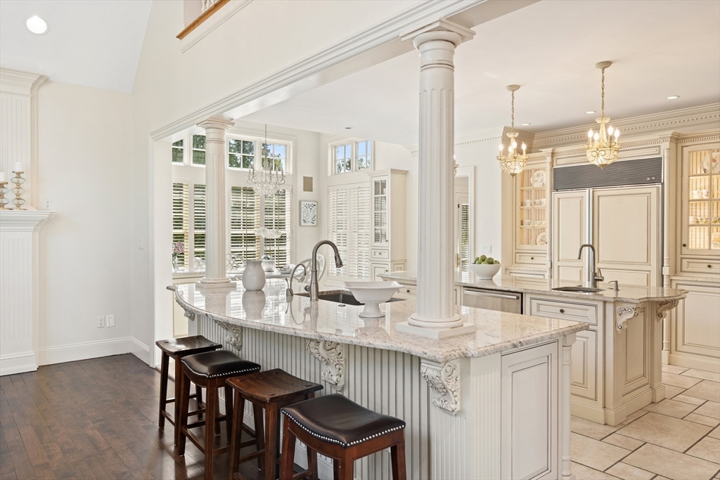 46 Porter Road Andover, MA 01810 - Photo 15 of 42 a kitchen with granite countertop a sink and cabinets