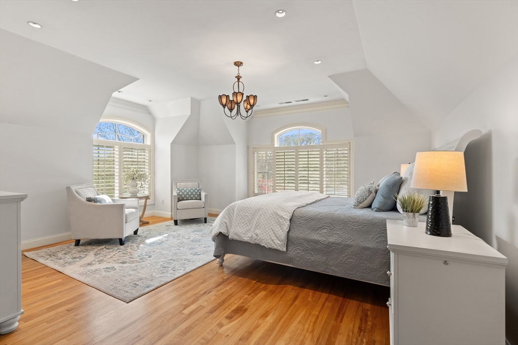 46 Porter Road Andover, MA 01810 - Photo 25 of 42 a bedroom with a bed and wooden floor