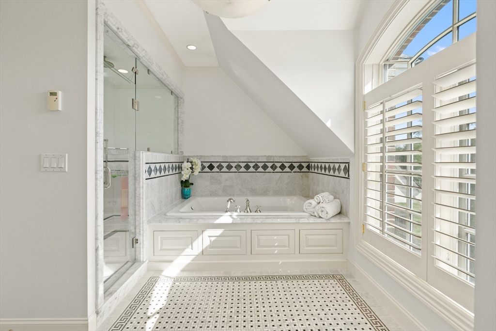 46 Porter Road Andover, MA 01810 - Photo 26 of 42 a bathroom with a granite countertop sink a mirror and a shower