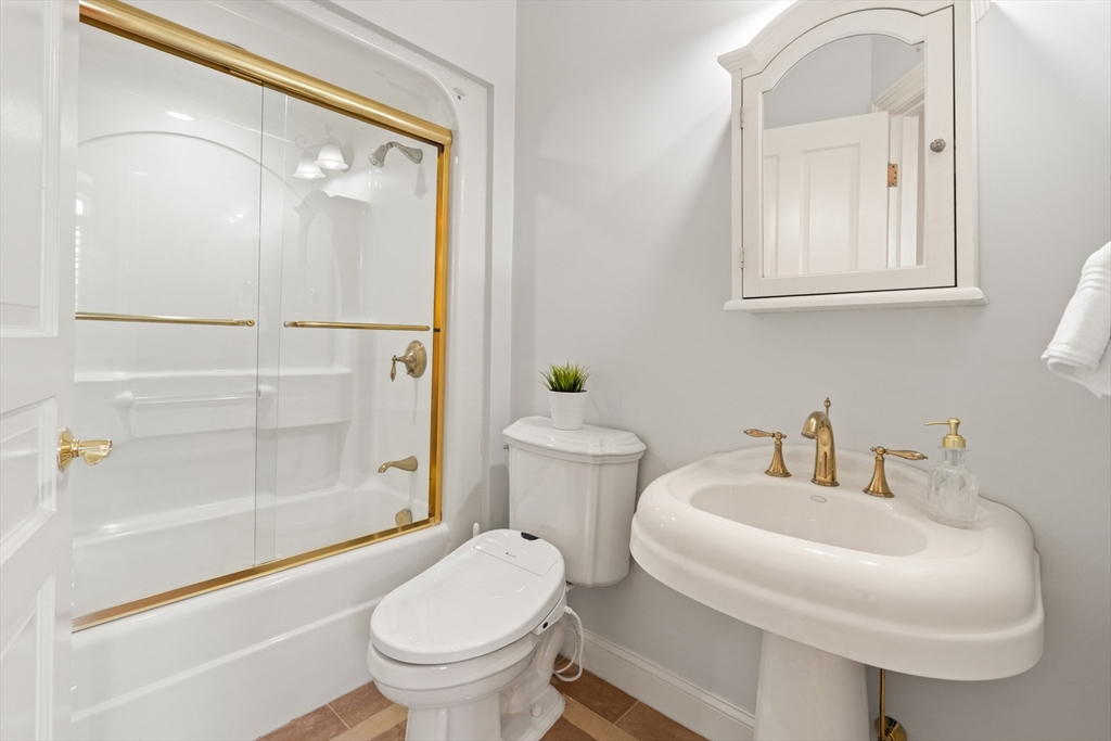 46 Porter Road Andover, MA 01810 - Photo 28 of 42 a bathroom with a sink toilet and shower