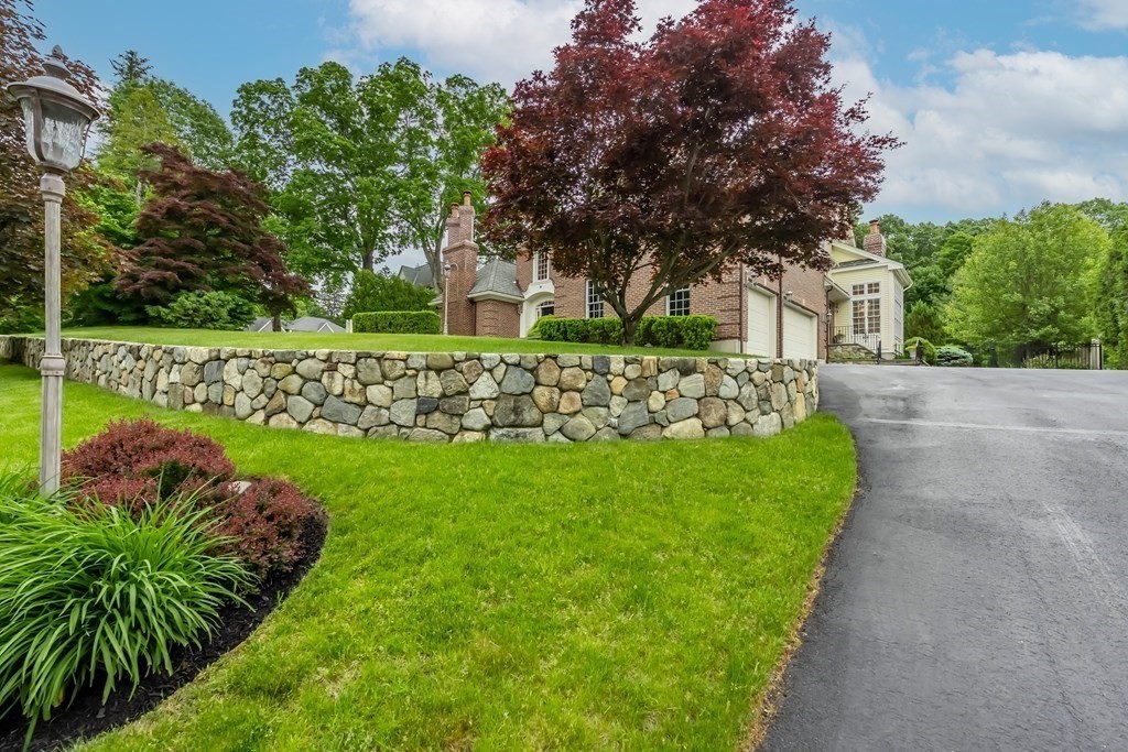 46 Porter Road Andover, MA 01810 - Photo 40 of 42 a front view of a house with garden