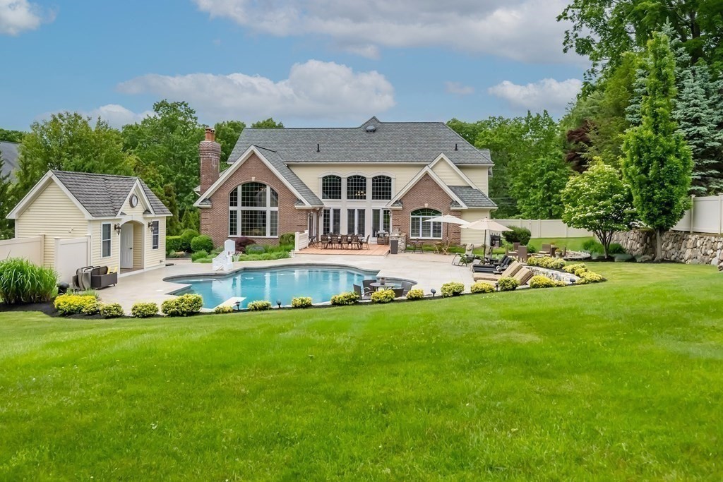 46 Porter Road Andover, MA 01810 - Photo 41 of 42 a front view of house with yard and green space