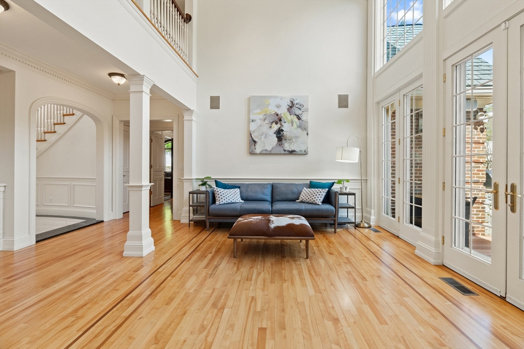 46 Porter Road Andover, MA 01810 - Photo 7 of 42 a living room with furniture and a wooden floor