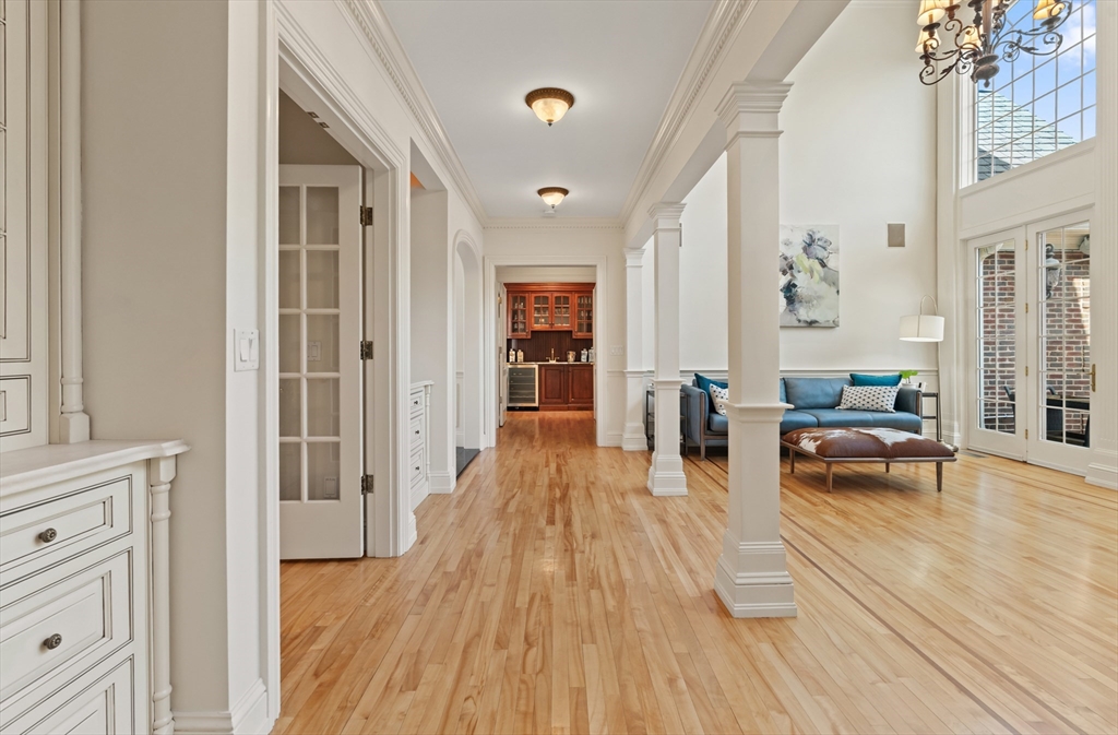 46 Porter Road Andover, MA 01810 - Photo 8 of 42 a view of a living room filled with furniture and wooden floor