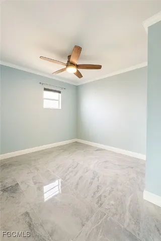 a bathroom with a toilet a sink a mirror a bathtub and vanity