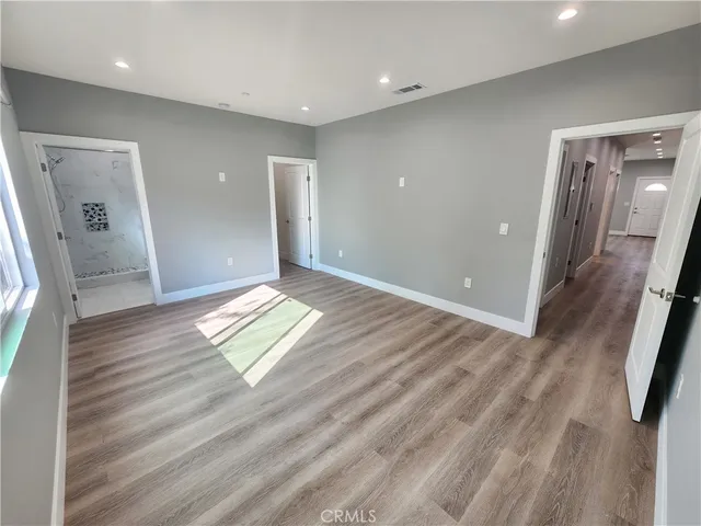 a view of an empty walk in closet