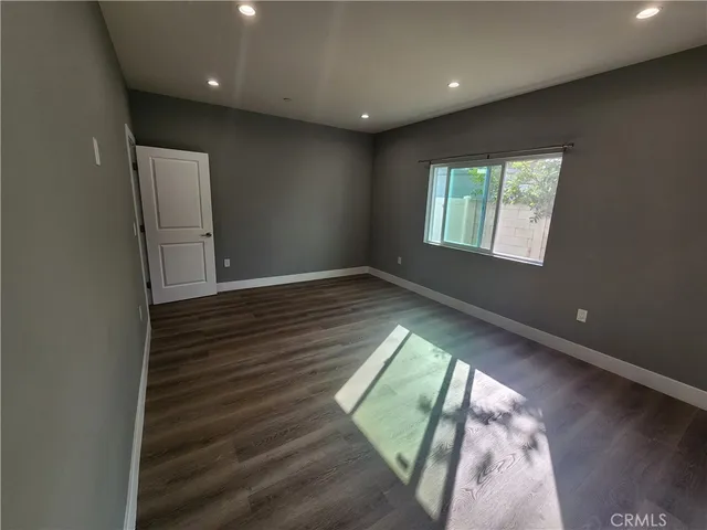 a bathroom with a shower and a sink