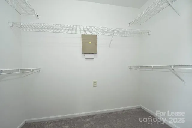 a view of a room with racks on the wall