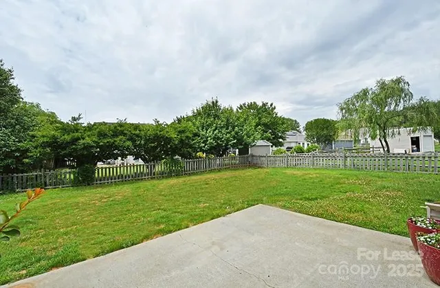 a view of a park and entertaining space