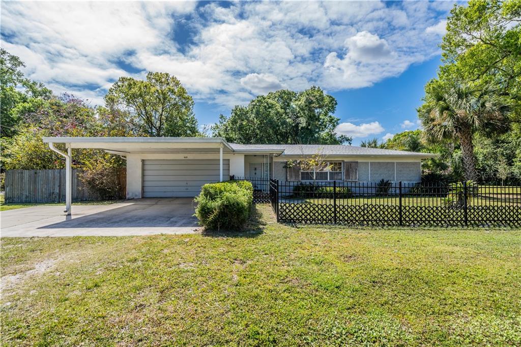 602 4th Avenue Southwest Ruskin, FL 33570 - Photo 1 of 1 a view of a house with a yard