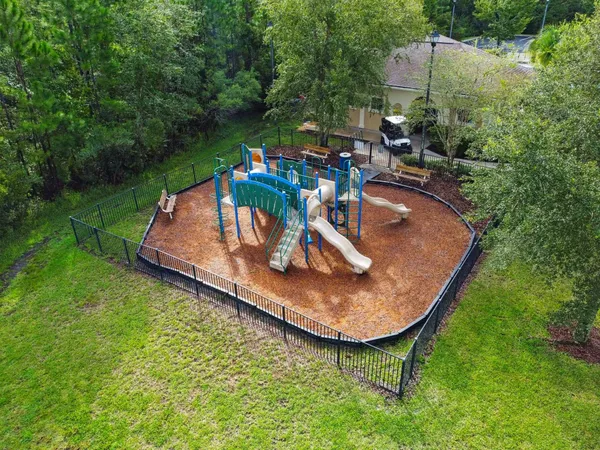 an aerial view of a house having yard