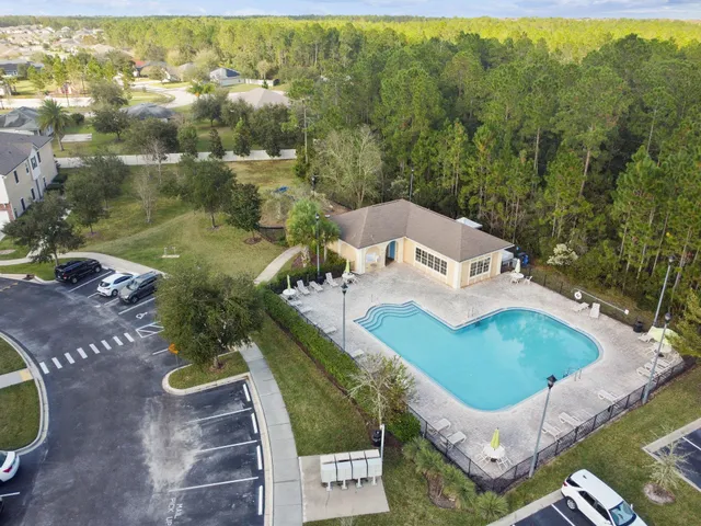 a view of a livingroom with furniture water view and a large window