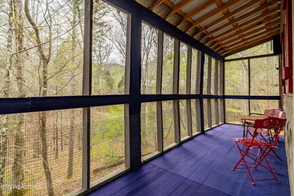 a sign that is on a tree