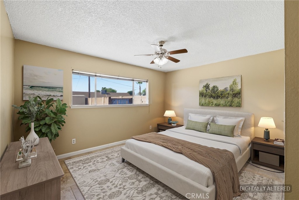 2234 Carter Way Hanford, CA 93230 - Photo 13 of 22 a bedroom with a bed and a window